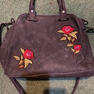 Charming Charlie’s “beauty and the beast” purse.